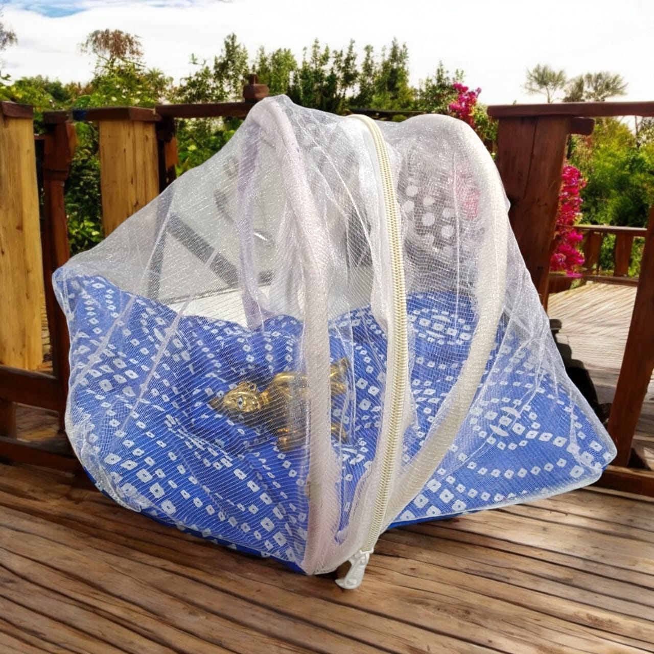 A large 10X13 inch comfortable bed with a mosquito net and three pillows, designed for Laddu Gopal or Radha Rani, available in Pink and Blue for home temple use.