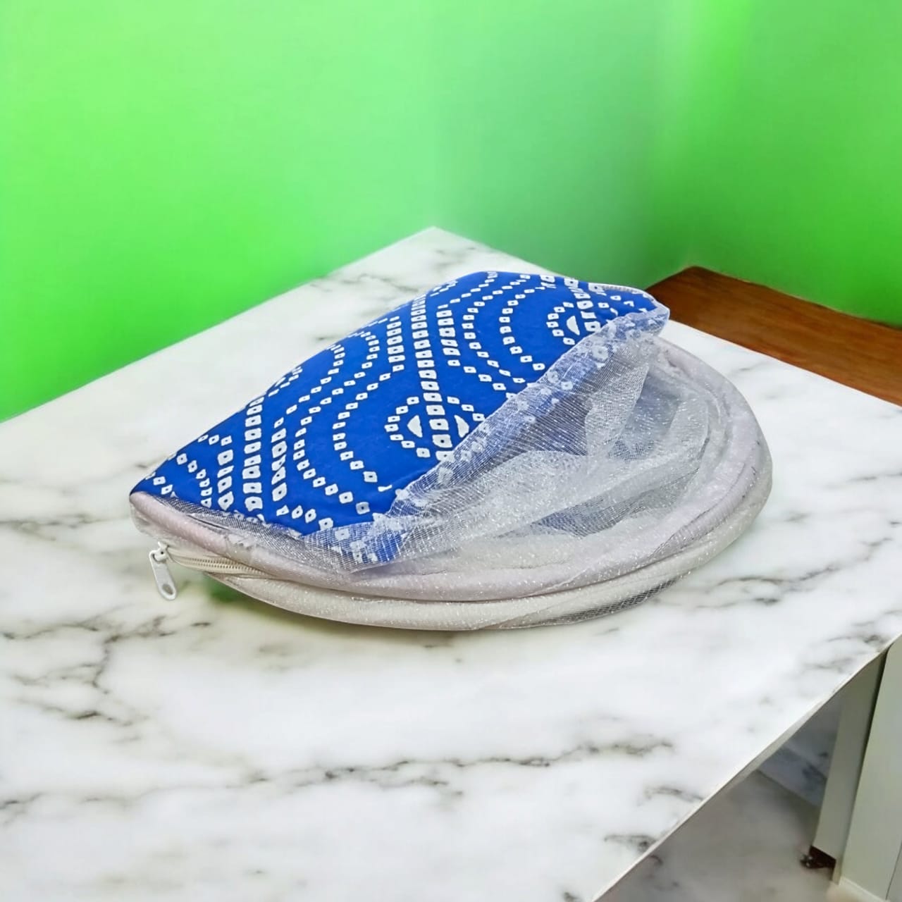 A large 10X13 inch comfortable bed with a mosquito net and three pillows, designed for Laddu Gopal or Radha Rani, available in Pink and Blue for home temple use.