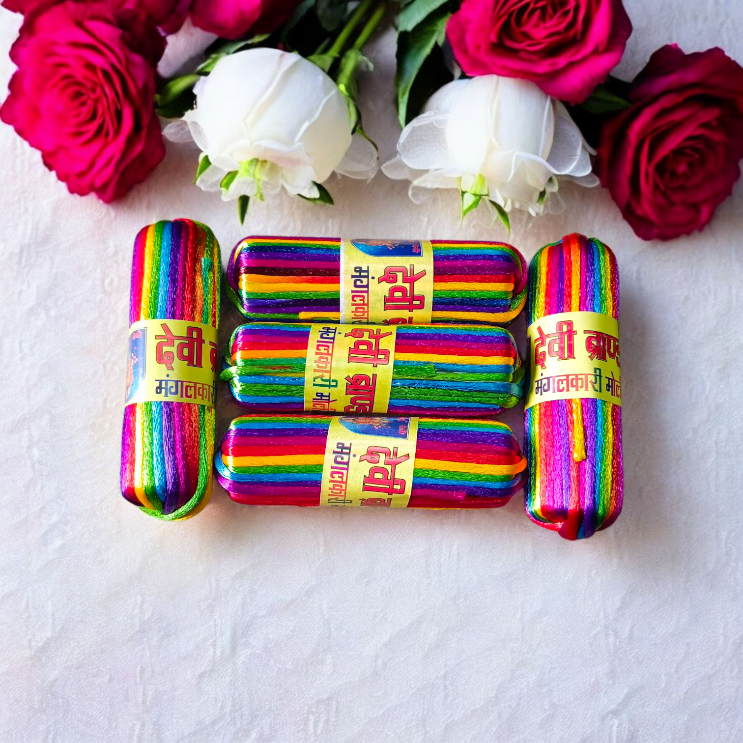 A pack of 5 colorful silk moli threads, each 11 feet long, traditionally used in Hindu pooja rituals for protection, blessings, and mannat dhaga ceremonies