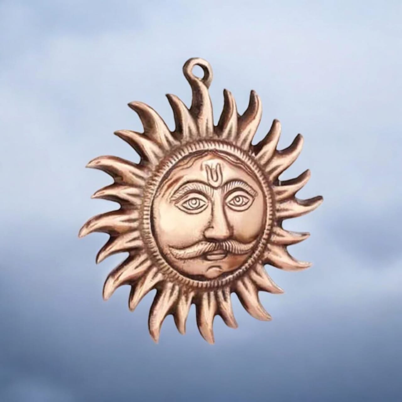A pure copper wall hanging sun, symbolizing strength and positivity, available in small (5 inch) and big (7 inch) sizes to protect from Vaastu Dosh and Shani Dosh.
