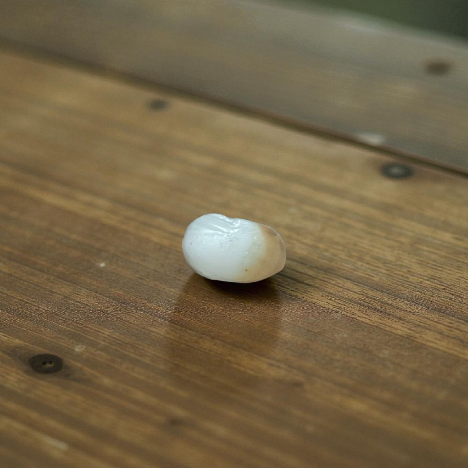 A pure, lab-certified Natural Shukra Mani gemstone without studded design, symbolizing Venus energy, love, and prosperity, displayed on a white background