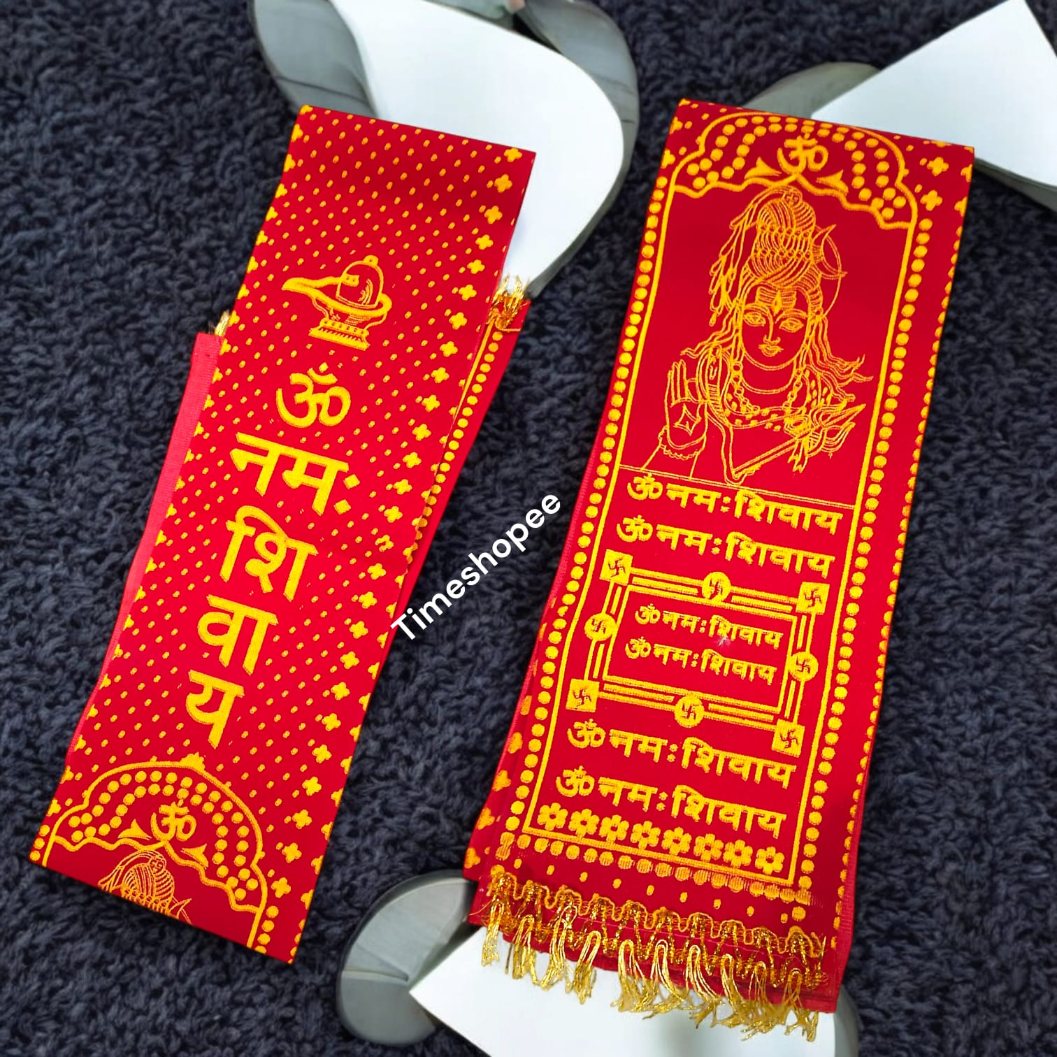 A pure satin stole with red and golden prints of the "Om Namah Shivay" mantra, used for Rudrabhishek and devotional ceremonies.