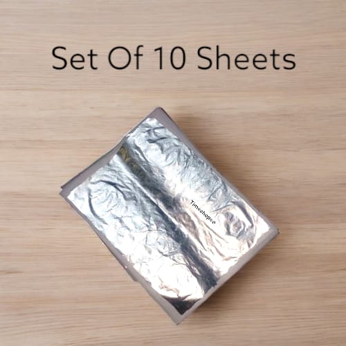 A set of 10 pure silver leaves (Chandi Vark) used for decorating offerings in religious ceremonies, particularly during Hanuman Ji worship.