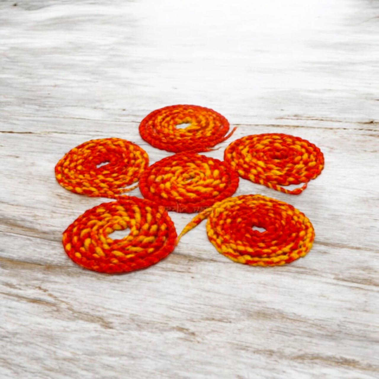 A set of 12 pure cotton red kalava wicks, each 20 inches long, perfect for Akhand Jyot and diya lighting during Hindu rituals.