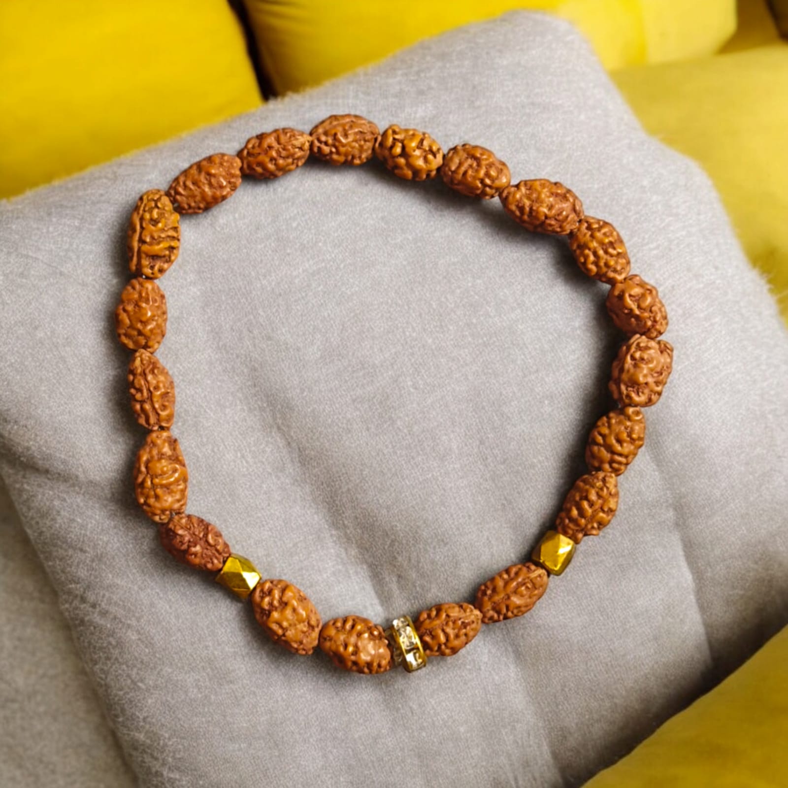 A stretchable 2 Mukhi Rudraksha bracelet featuring 8MM lab-certified beads designed to improve communication skills and promote clarity of thought.