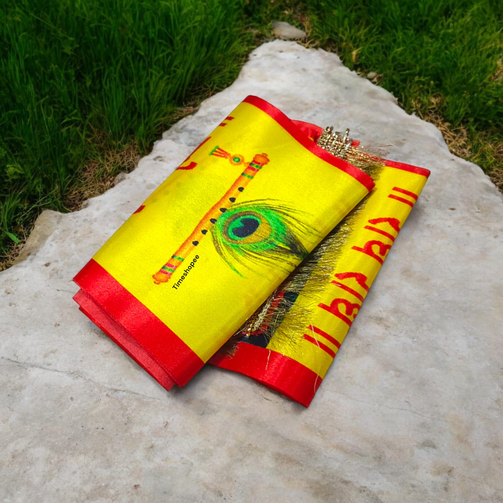 A vibrant satin stole with "Radhe Radhe" print, perfect for pooja and kirtan.