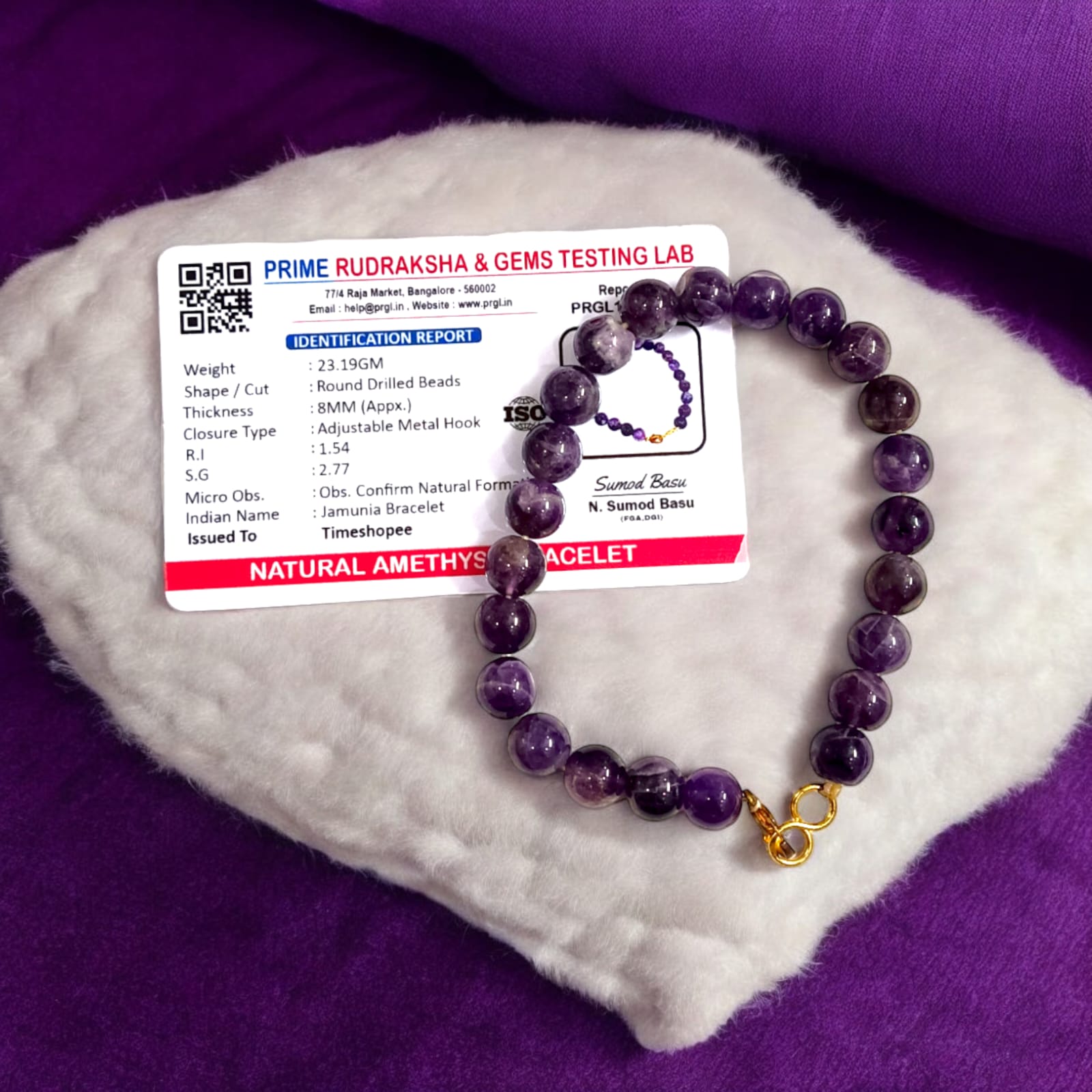 Amethyst bracelet with 8MM beads, showcasing its elegant design and lab certification.