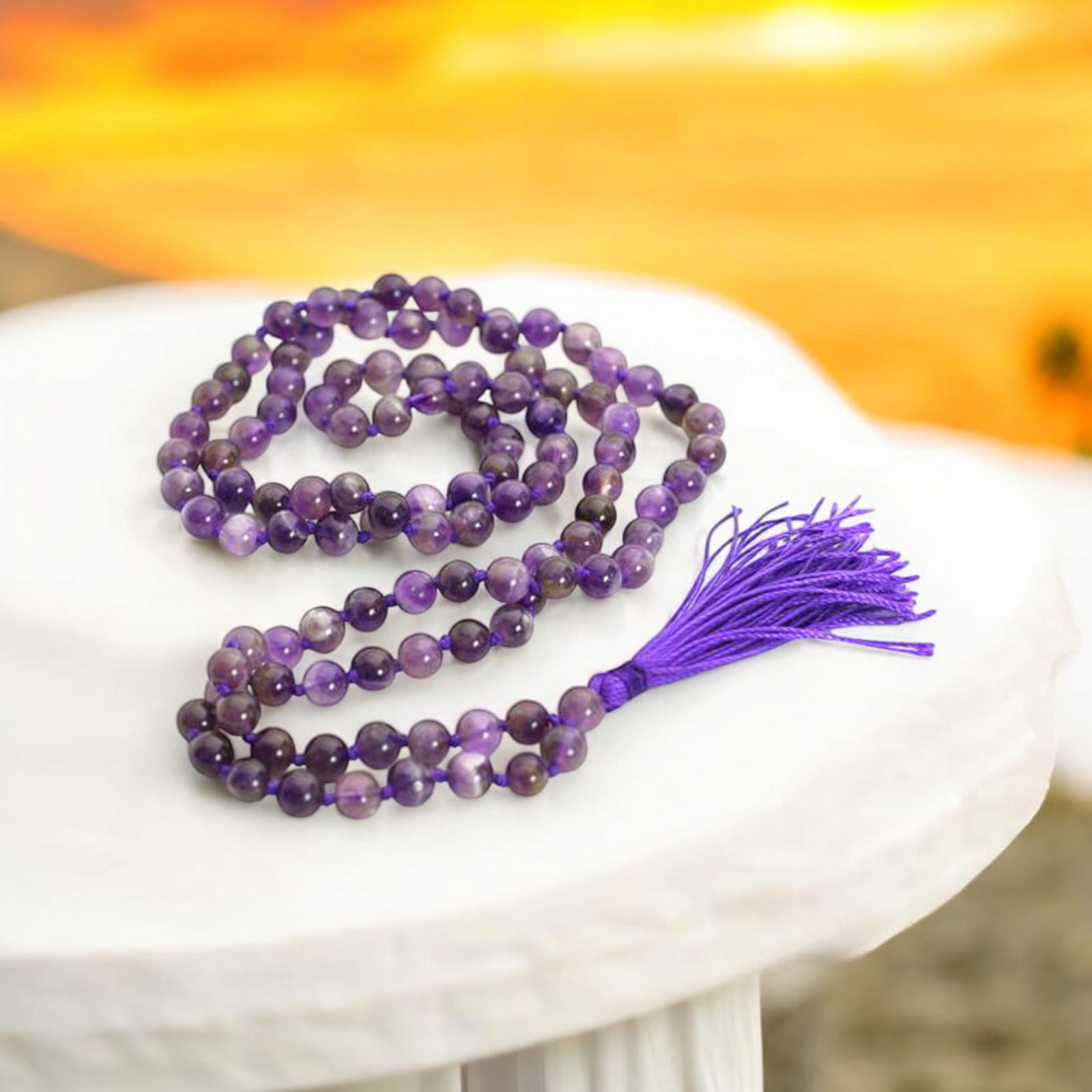 Amethyst mala with 108+1 beads in 7MM and 8MM sizes, perfect for meditation, spiritual growth, and everyday wear.