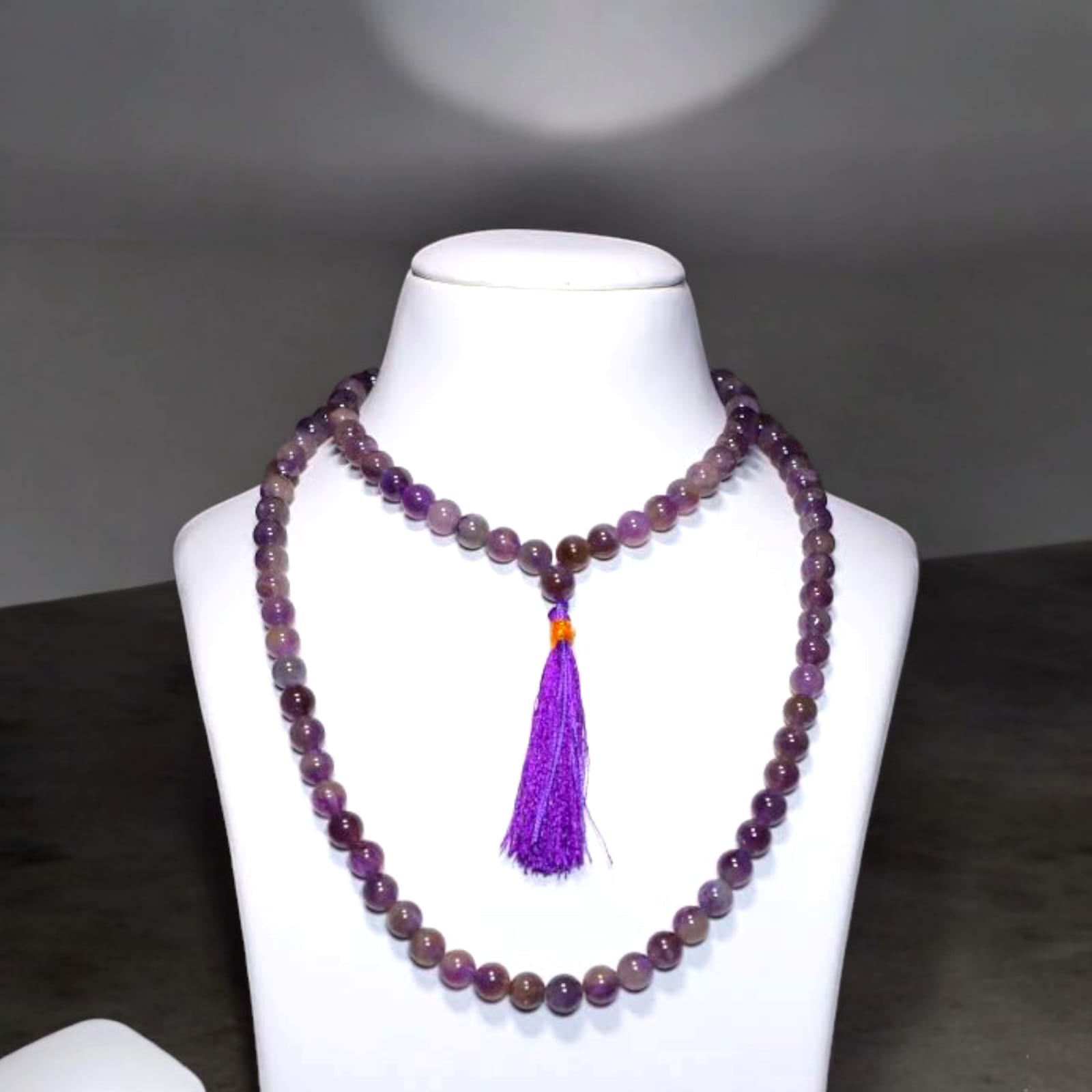 Amethyst mala with 108+1 beads in 7MM and 8MM sizes, perfect for meditation, spiritual growth, and everyday wear.