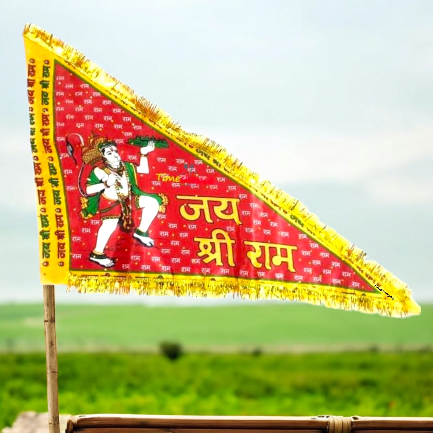 An orange (Bhagwa) Hanuman Ji Jhanda with Jai Shri Ram text, available in various sizes, ideal for home, office, and temple display.