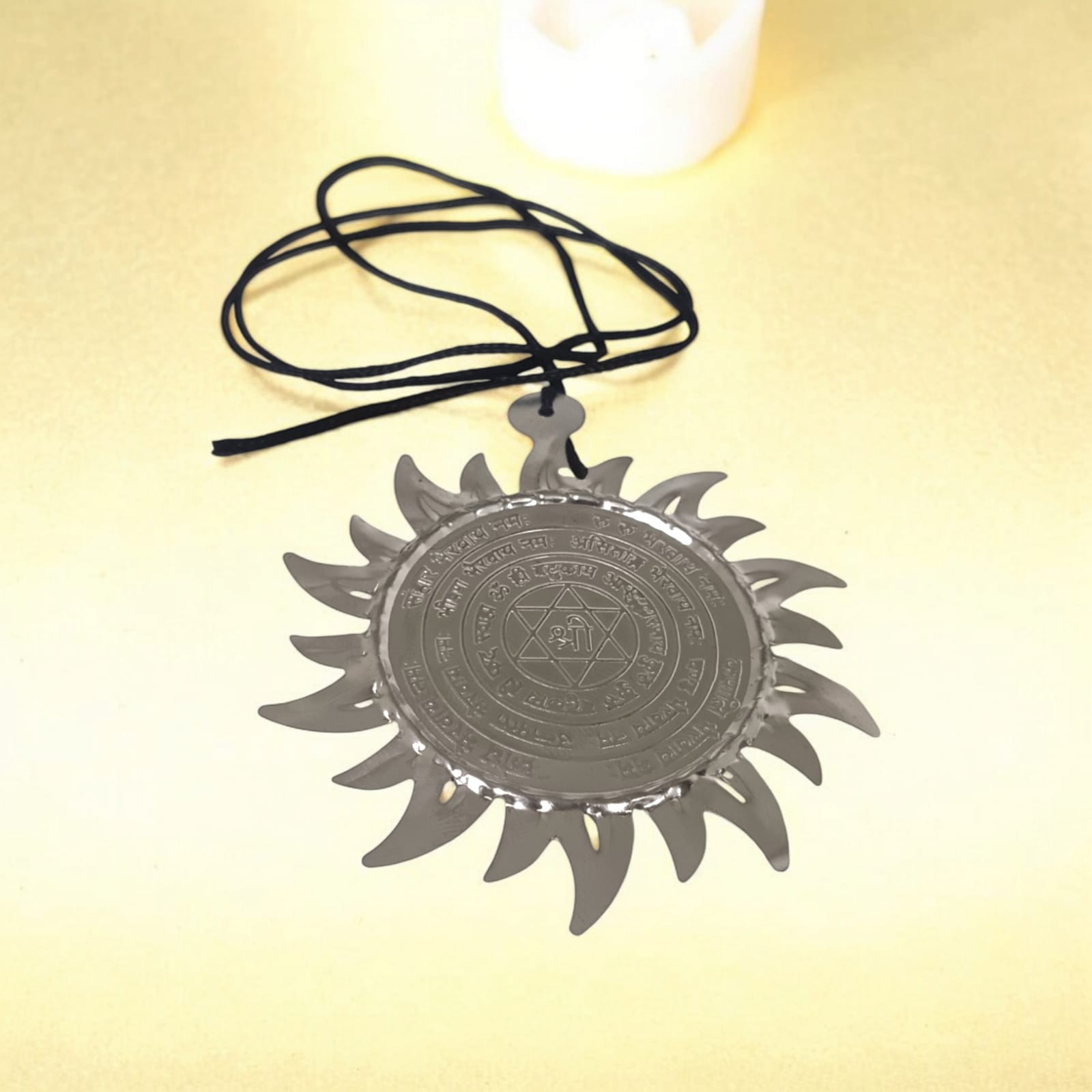 Ashtbhairav Yantra with black thread, featuring detailed depictions of eight Bhairavas, designed for hanging in home or office for protection and positive energy.