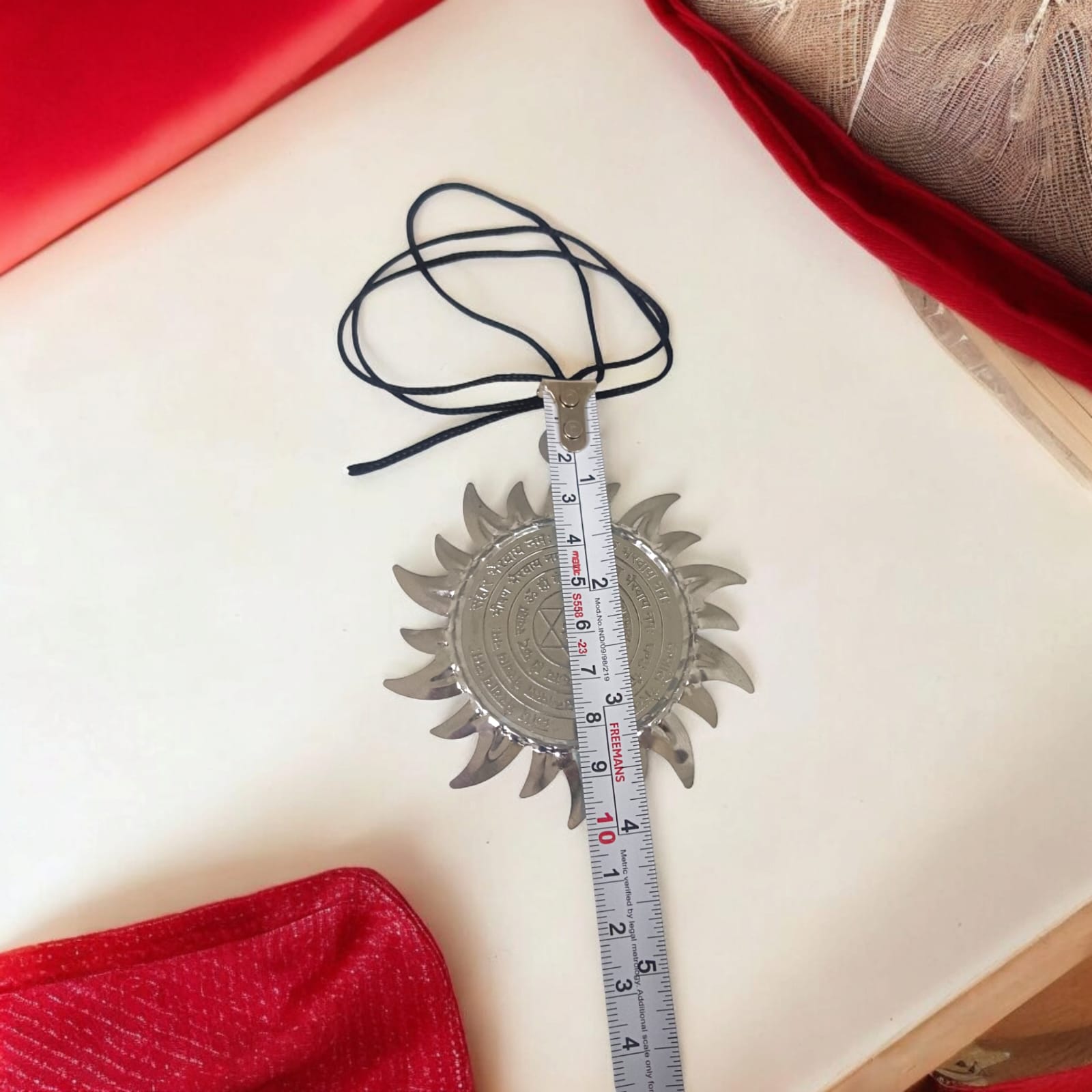 Ashtbhairav Yantra with black thread, featuring detailed depictions of eight Bhairavas, designed for hanging in home or office for protection and positive energy.