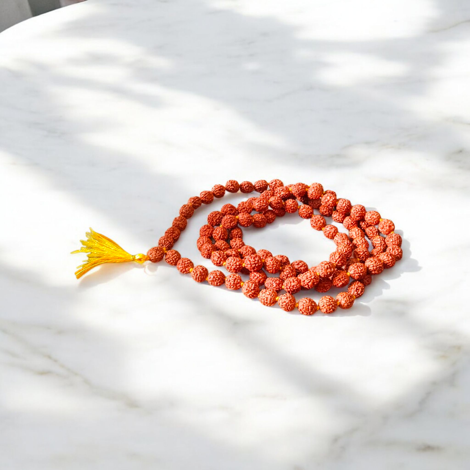 Authentic 5 Mukhi Rudraksha Mala and Pendant Combo placed on a white background with sacred thread and spiritual packaging