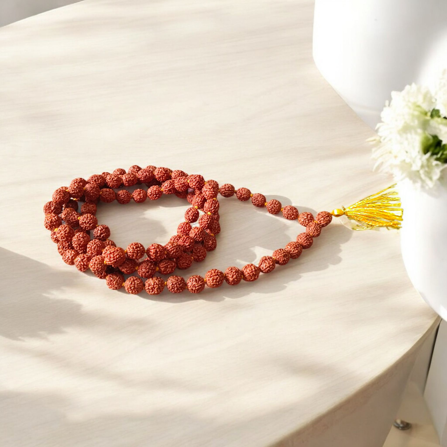 Authentic 5 Mukhi Rudraksha Mala and Pendant Combo placed on a white background with sacred thread and spiritual packaging