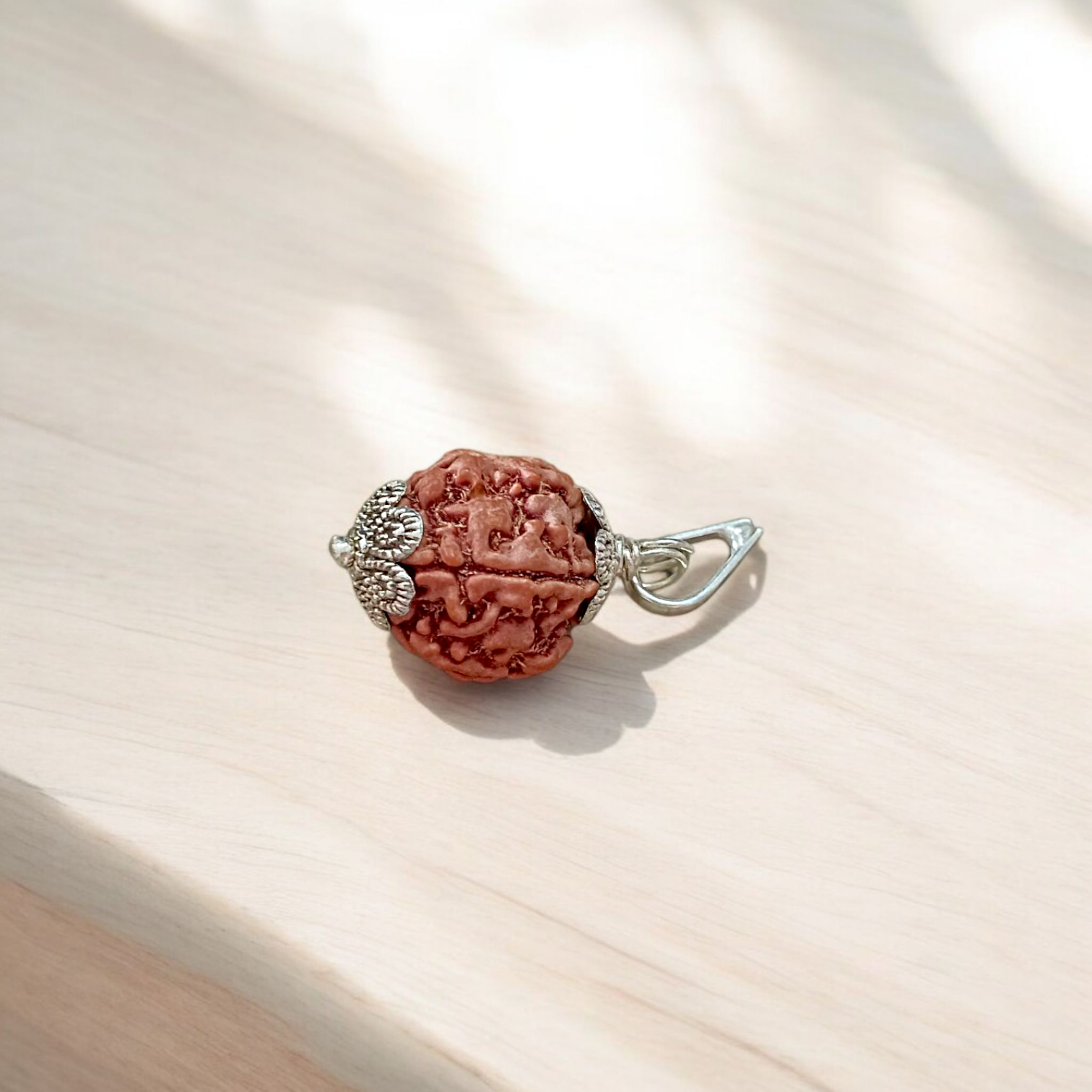 Authentic 5 Mukhi Rudraksha Mala and Pendant Combo placed on a white background with sacred thread and spiritual packaging