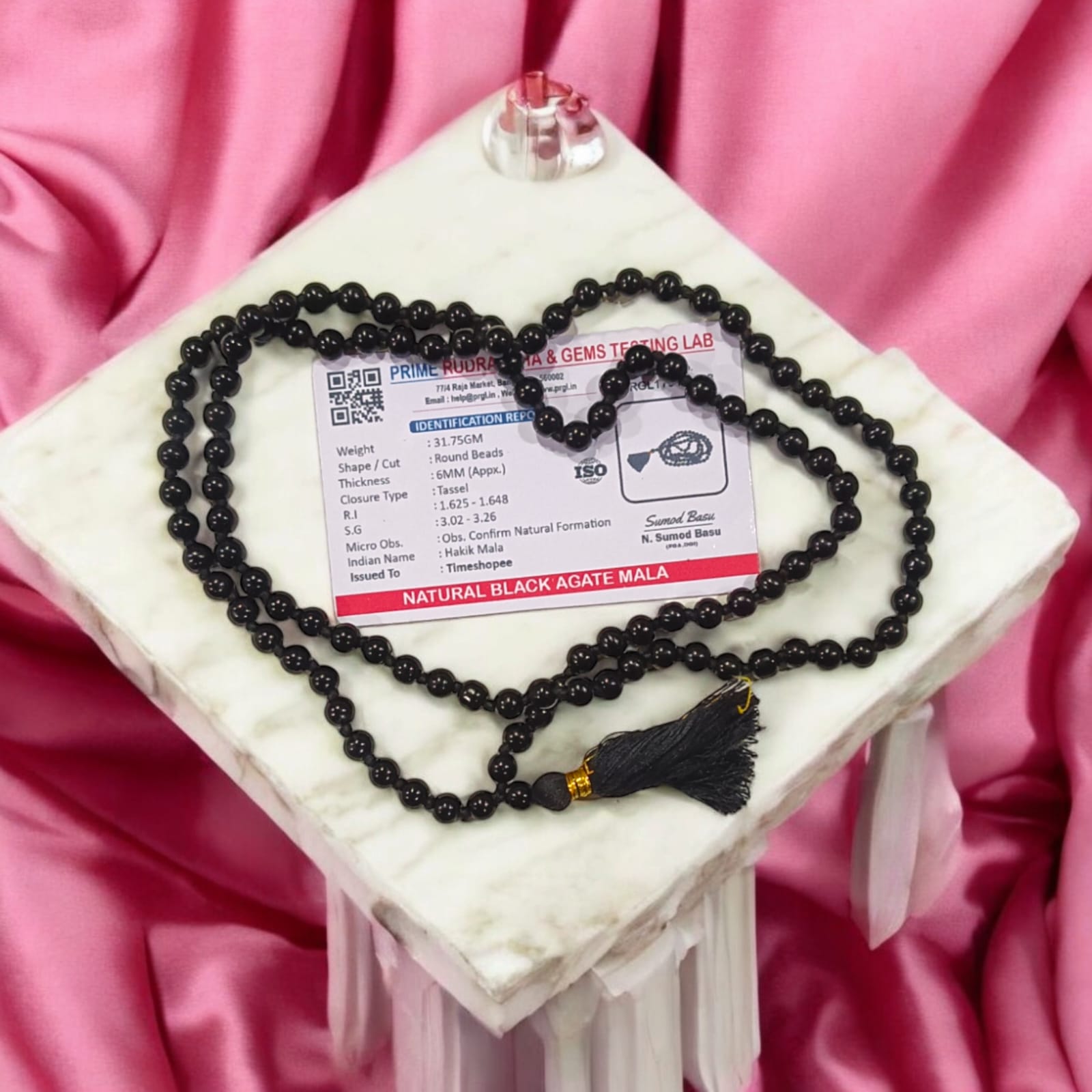 Black Hakik Mala with 6MM beads, 108+1 beads, lab-certified for authenticity, shown in a close-up view.