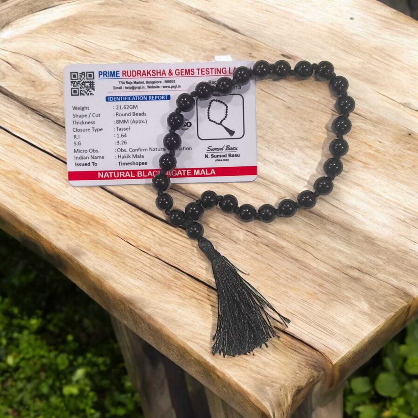 Black Hakik Mala with 8MM beads and 27+1 bead count, lab-certified for authenticity, shown in a convenient, easy-to-carry design.