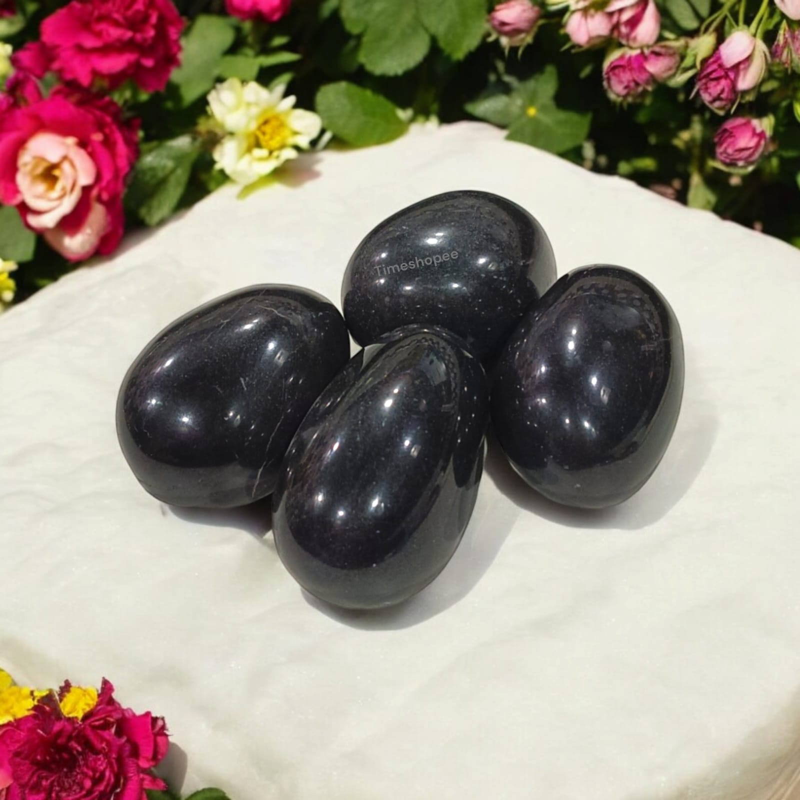 Black Shivling Stone for Tulsi and temple use, symbolizing strength and divine energy with unique natural patterns.