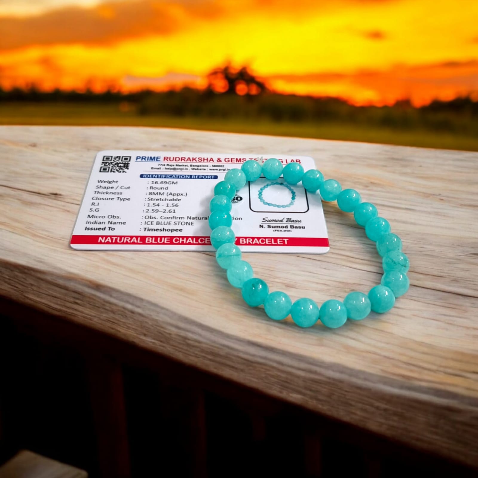 Blue Chalcedony Bracelet with lab certification, showcasing the stretchable design and soothing blue crystal.