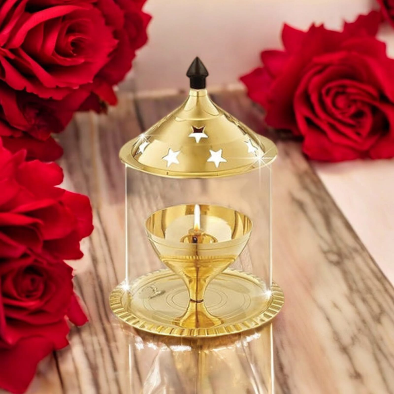 Brass Akhand Jyot with borosilicate glass, available in two sizes, designed for burning desi ghee, with a protective glass cover for steady flame.