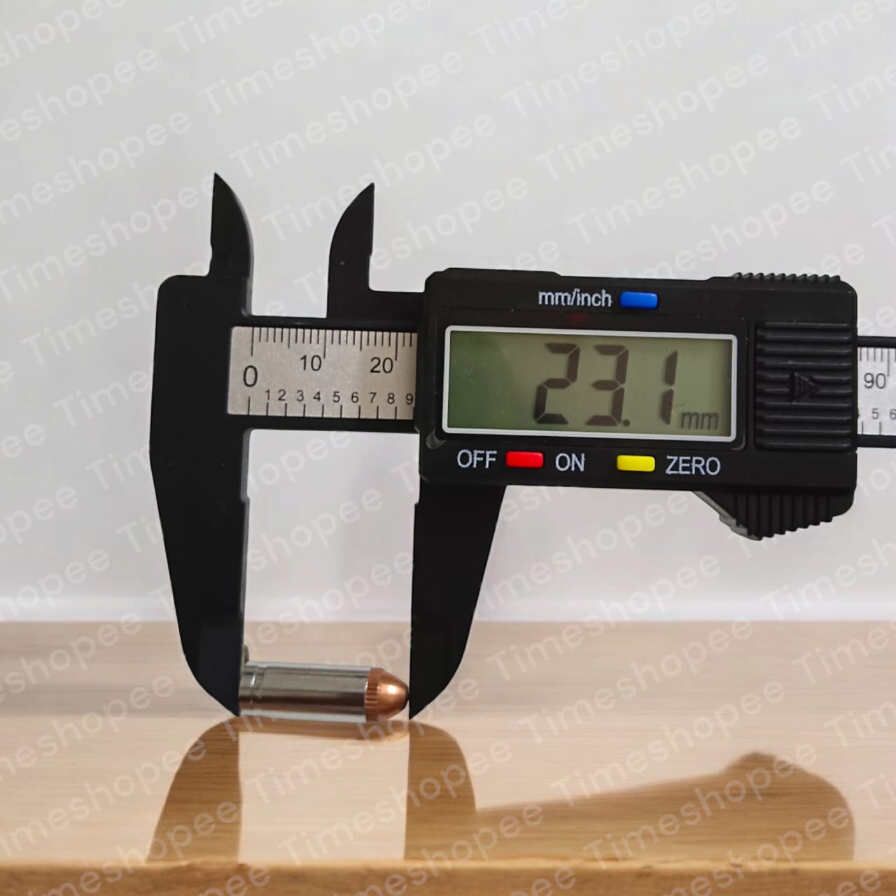 Bullet-shaped silver and copper taweez amulets with a Bhojpatra sheet, showcasing their unique design and spiritual significance.