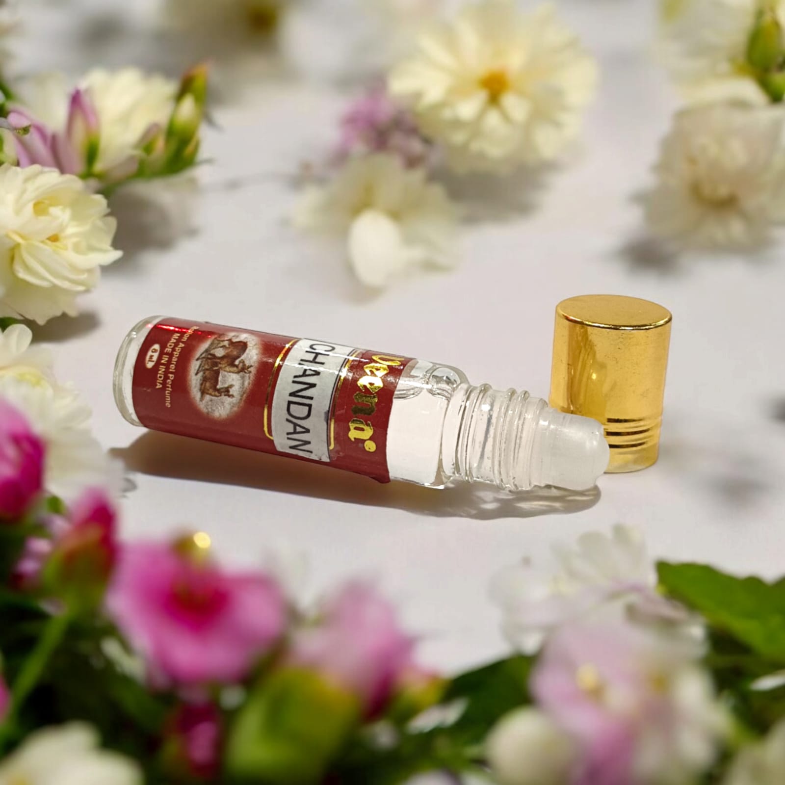 Chandan Attar 8ml roll-on bottle by Veena - Alcohol-free premium perfume for daily use and worship by Timeshopee