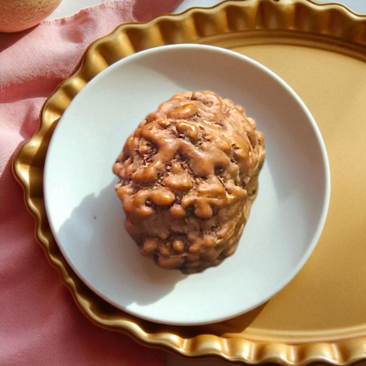 Close-up image of a lab-certified, original 10 Mukhi Rudraksha bead with clear natural grooves, placed on a wooden surface