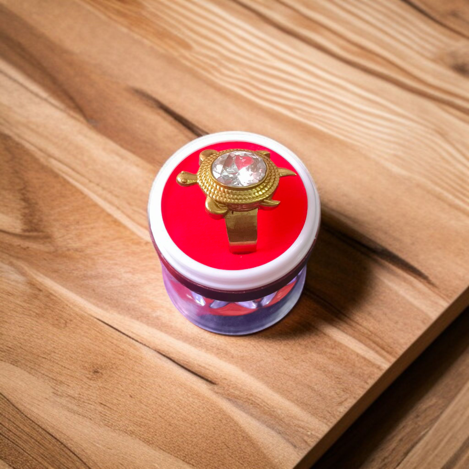 Close-up image of the Kachua Diamond Ring, featuring a diamond set in a tortoise-shaped design made from Ashtdhatu. The ring is adjustable, with intricate detailing suitable for both men and women.