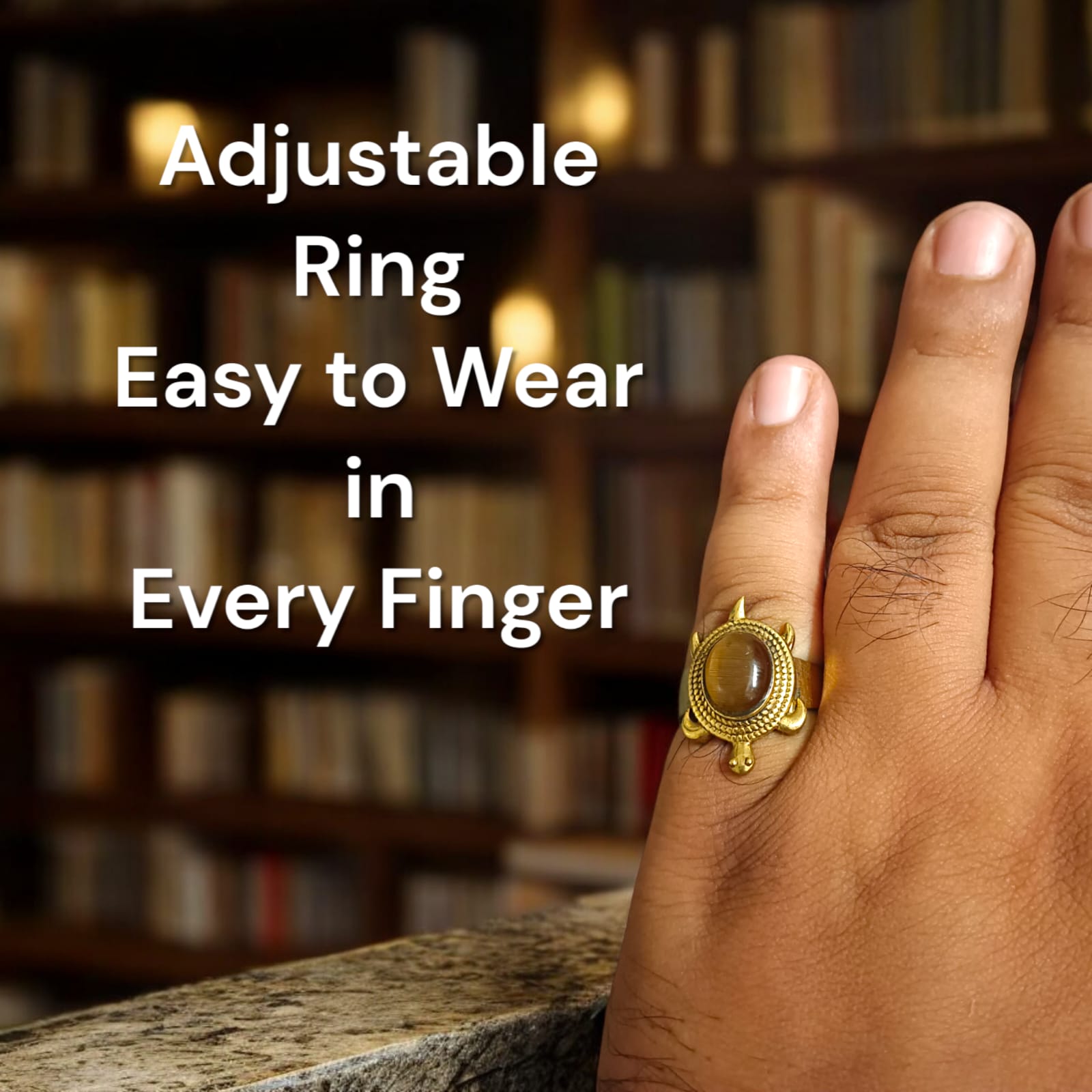 Close-up image of the Kachua Tiger Eye Ring, featuring a brown and gold Tiger Eye gemstone set in a tortoise-shaped design, made from Ashtdhatu. The ring is adjustable and unisex.