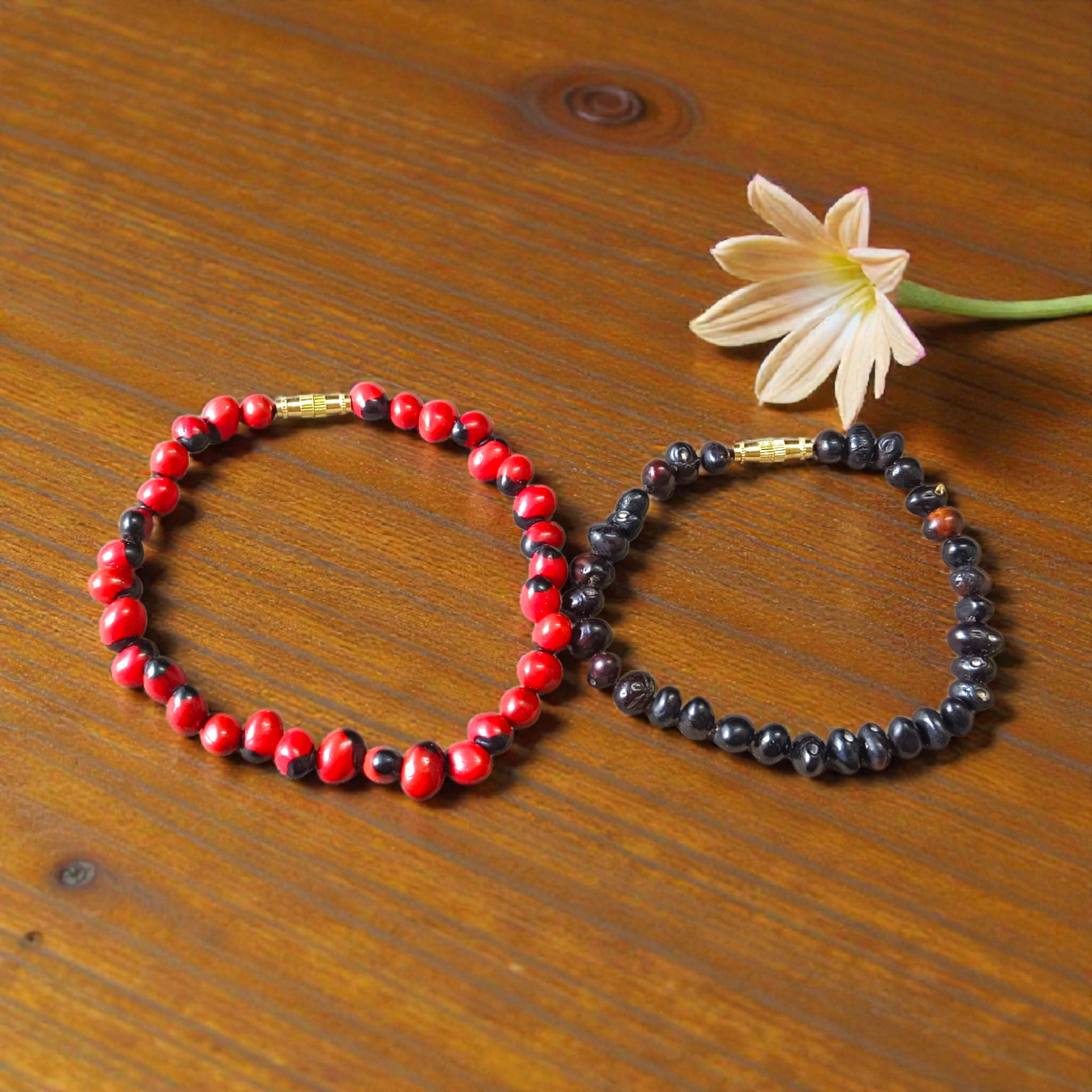 Combo of Black Gunja Bracelet and Red Gunja Bracelet with lab-certified natural beads, stretchable design for protection and energy