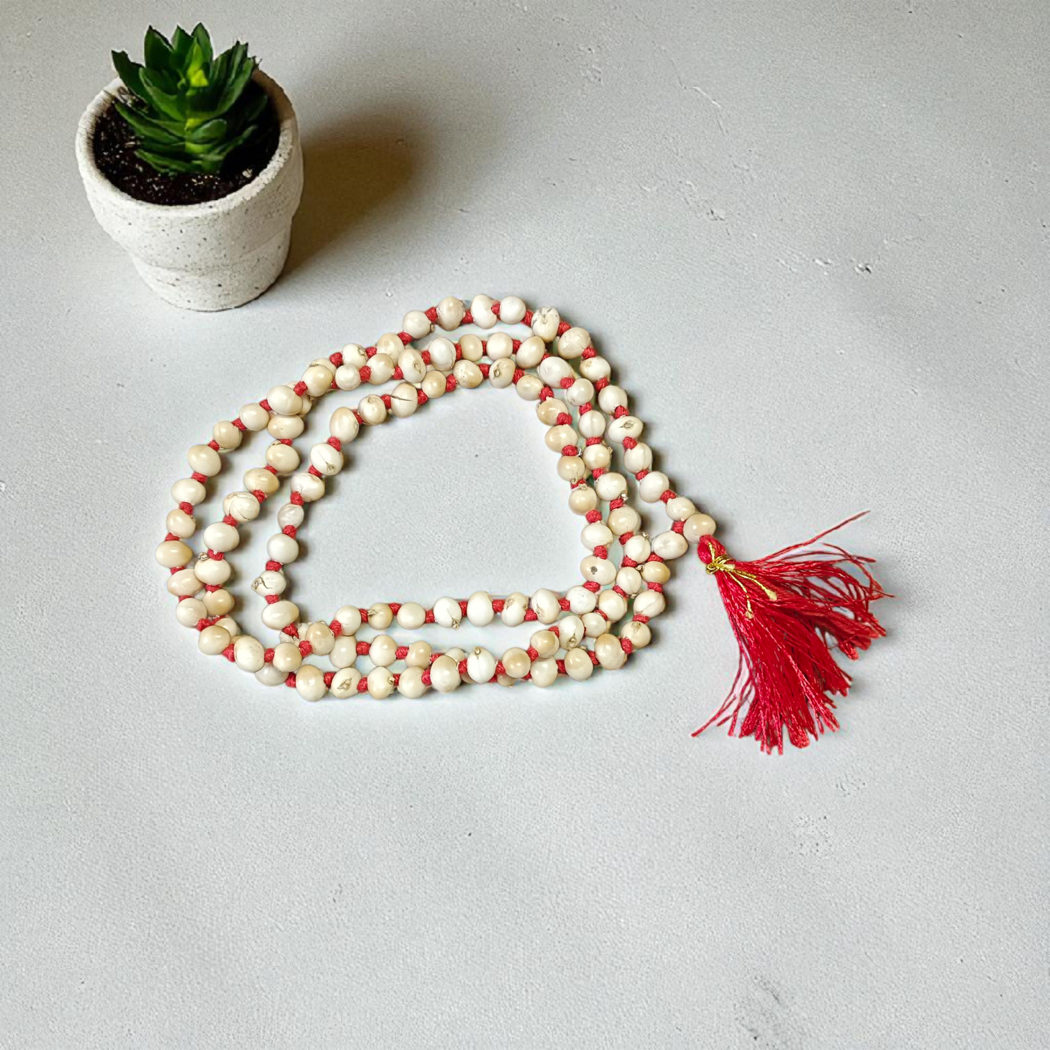 Combo of red and white Gunja mala made of 108+1 original seeds, ideal for Hanuman bhakti, tantra, and spiritual rituals