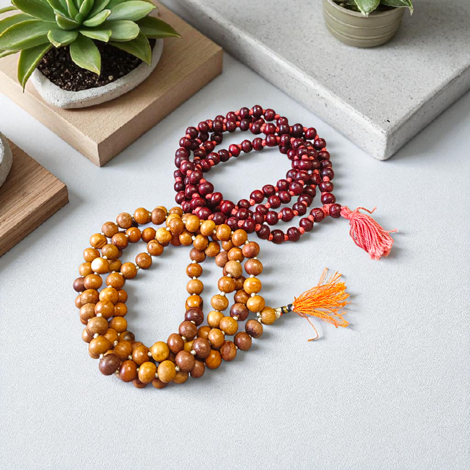 Combo of red and white sandalwood jaap mala with 108 beads used for meditation, chanting, and puja rituals – ideal for peace and prosperity