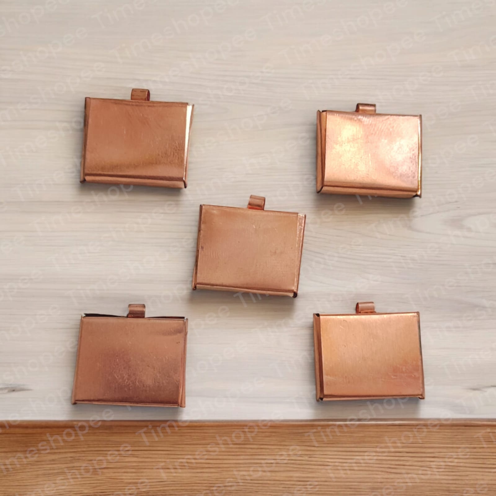 Copper Square Taweez set of 5, golden color, 21.7MM and 26.7MM sizes with free Bhojpatra sheet, ideal for Muslim Tantra and spiritual practices.