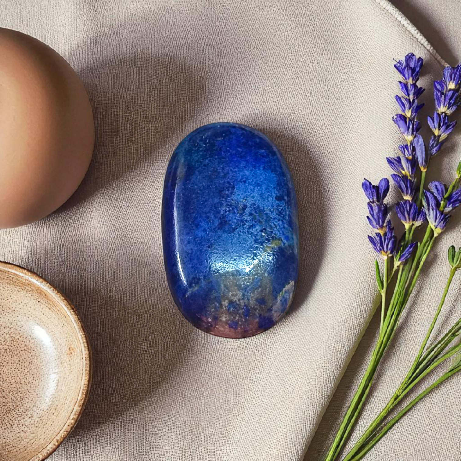 Deep blue Lapis Lazuli stone with golden flecks, used for mental clarity and emotional healing