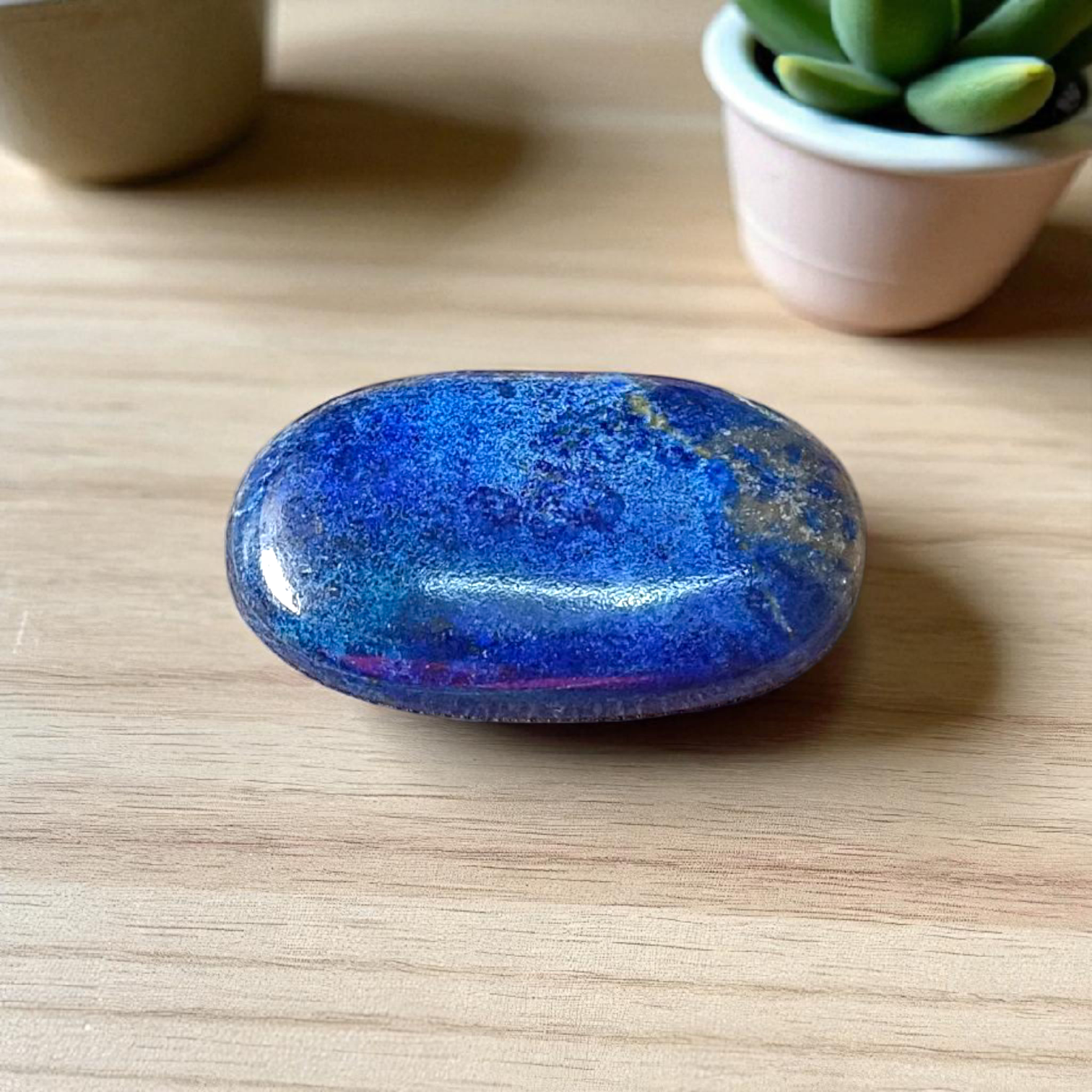 Deep blue Lapis Lazuli stone with golden flecks, used for mental clarity and emotional healing