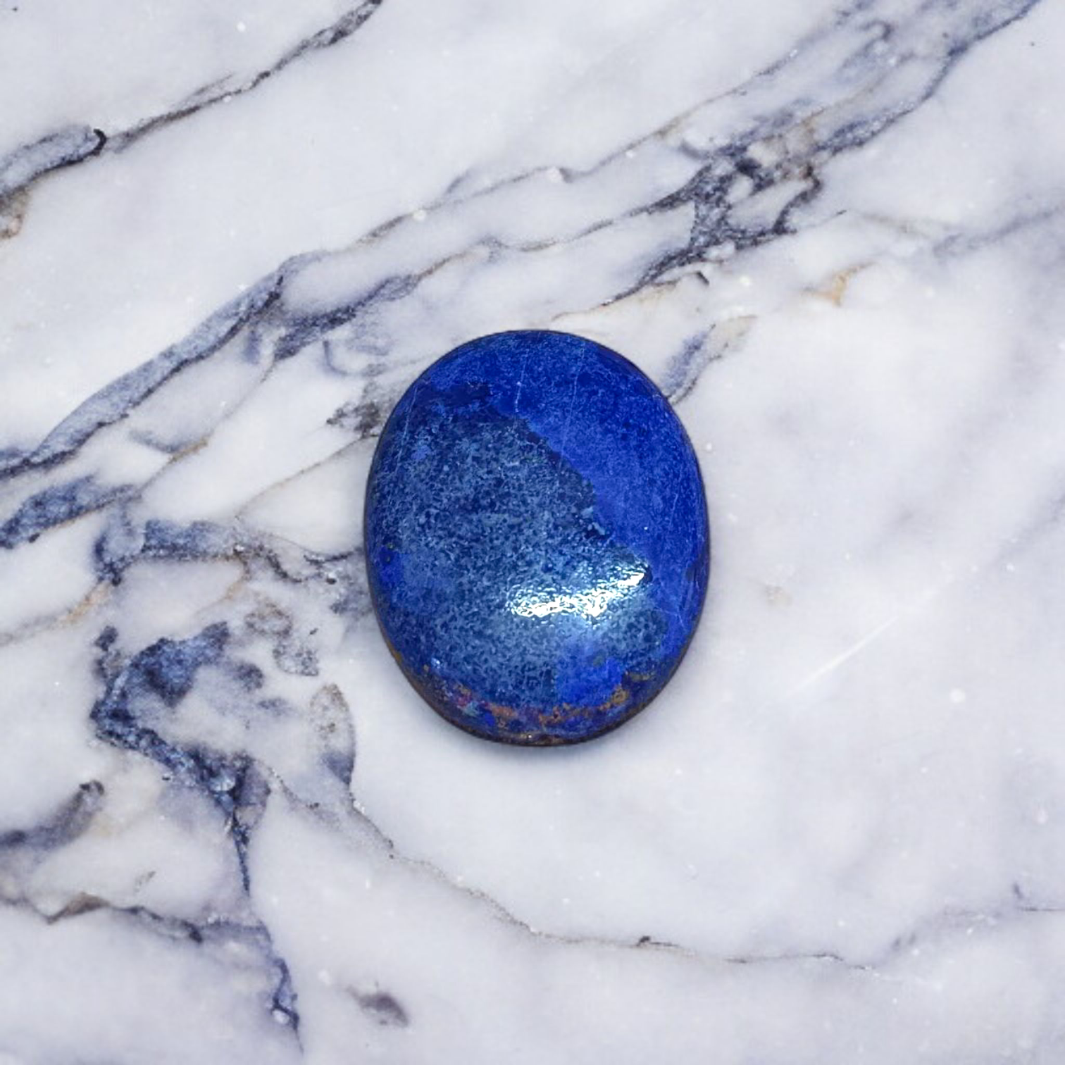 Deep blue Lapis Lazuli stone with golden flecks, used for mental clarity and emotional healing