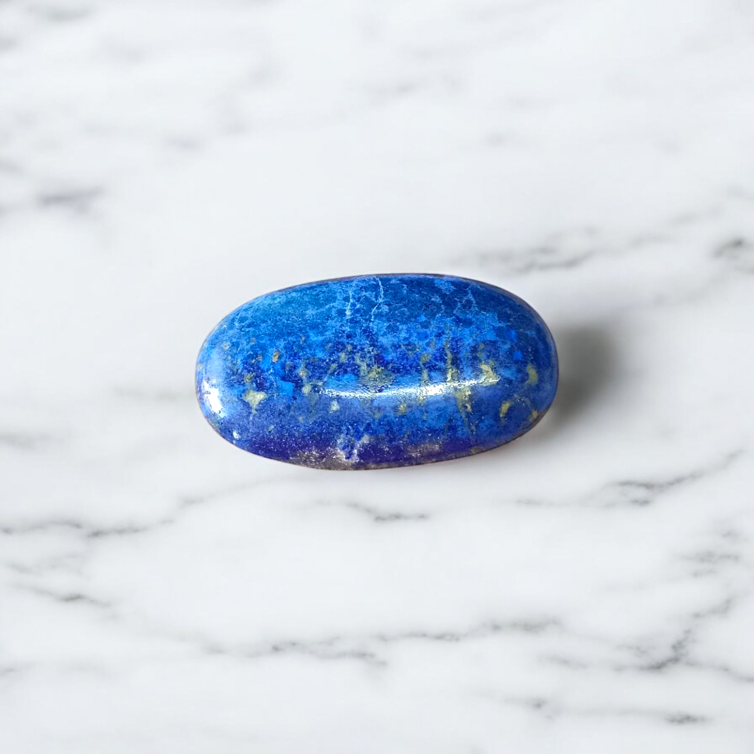 Deep blue Lapis Lazuli stone with golden flecks, used for mental clarity and emotional healing