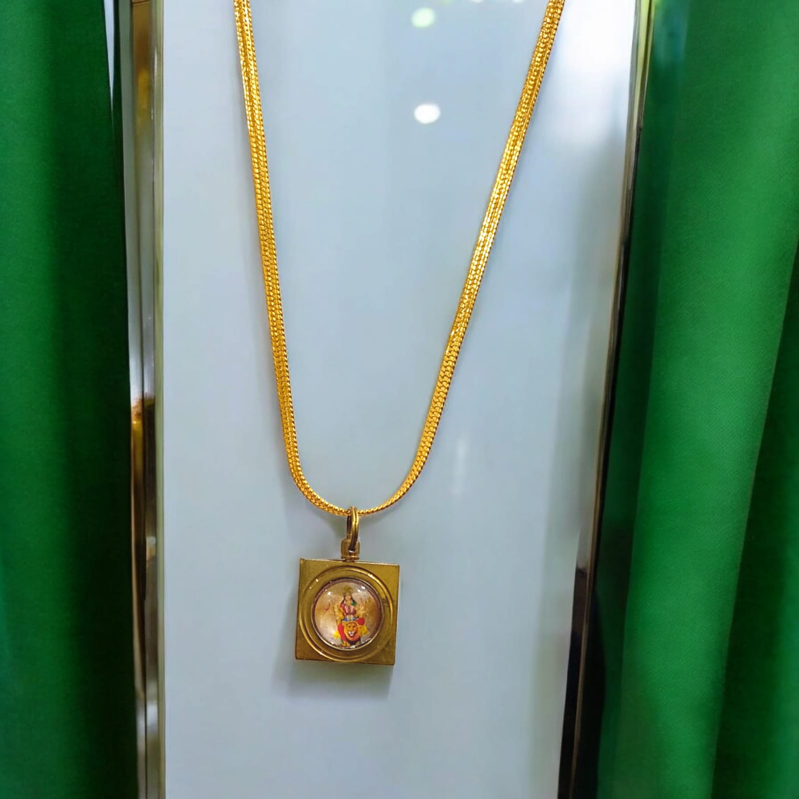 Durga Beesa Locket with Durga Mata image and Durga Beesa Yantra on the back, gold-plated chain, available at Timeshopee