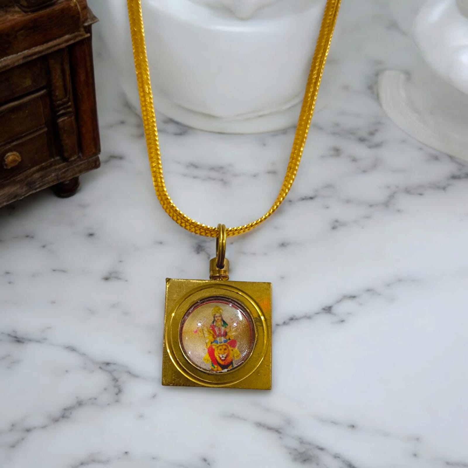 Durga Beesa Locket with Durga Mata image and Durga Beesa Yantra on the back, gold-plated chain, available at Timeshopee