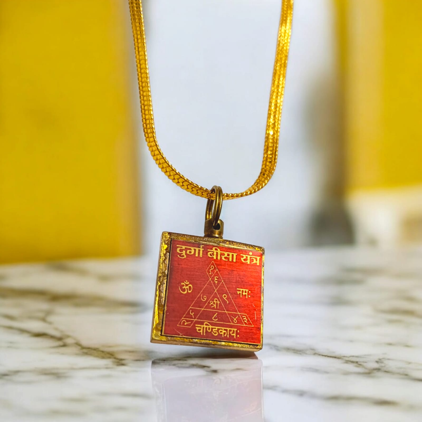 Durga Beesa Locket with Durga Mata image and Durga Beesa Yantra on the back, gold-plated chain, available at Timeshopee