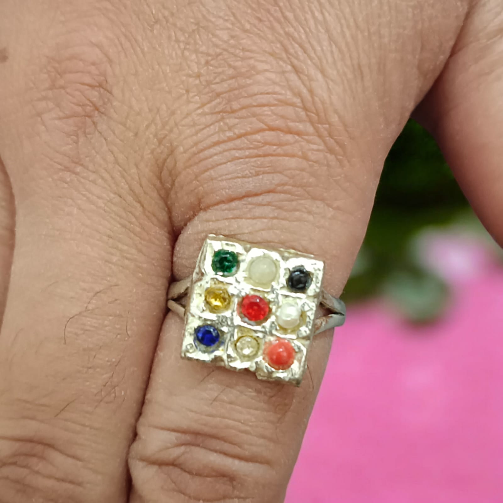 Elegant Navratan ring with a square-shaped design featuring nine vibrant gemstones, available at Timeshopee.
