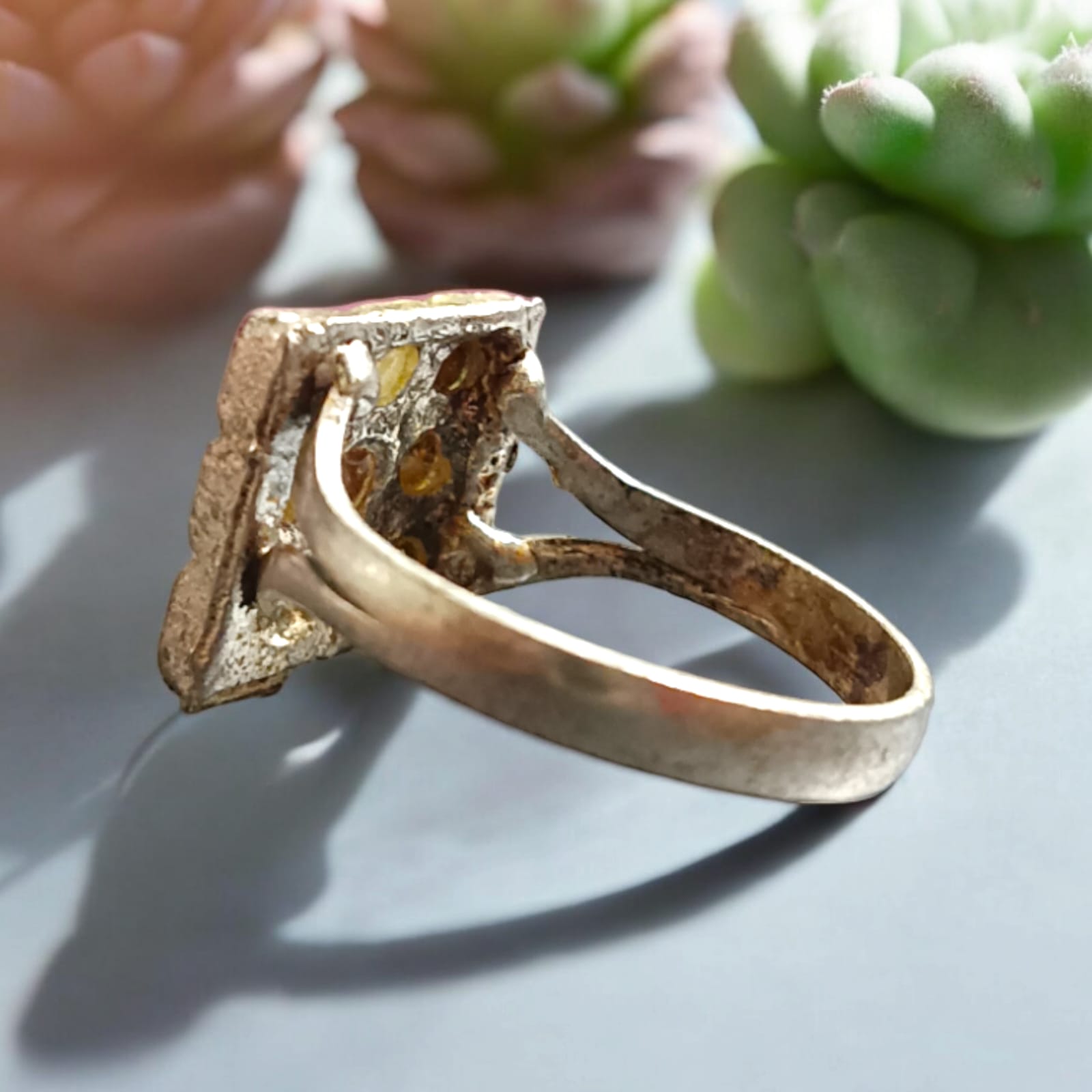 Elegant Navratan ring with a square-shaped design featuring nine vibrant gemstones, available at Timeshopee.