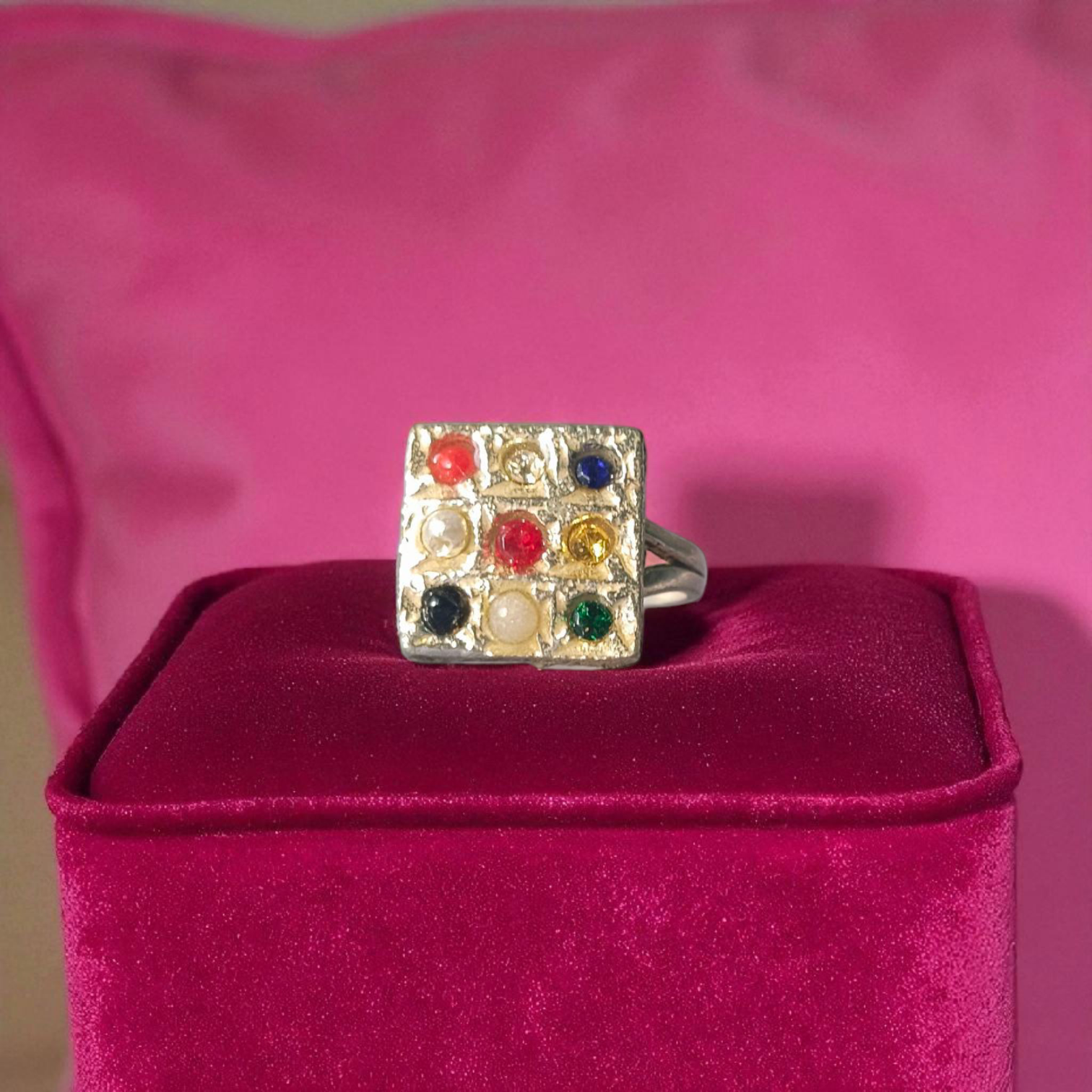 Elegant Navratan ring with a square-shaped design featuring nine vibrant gemstones, available at Timeshopee.
