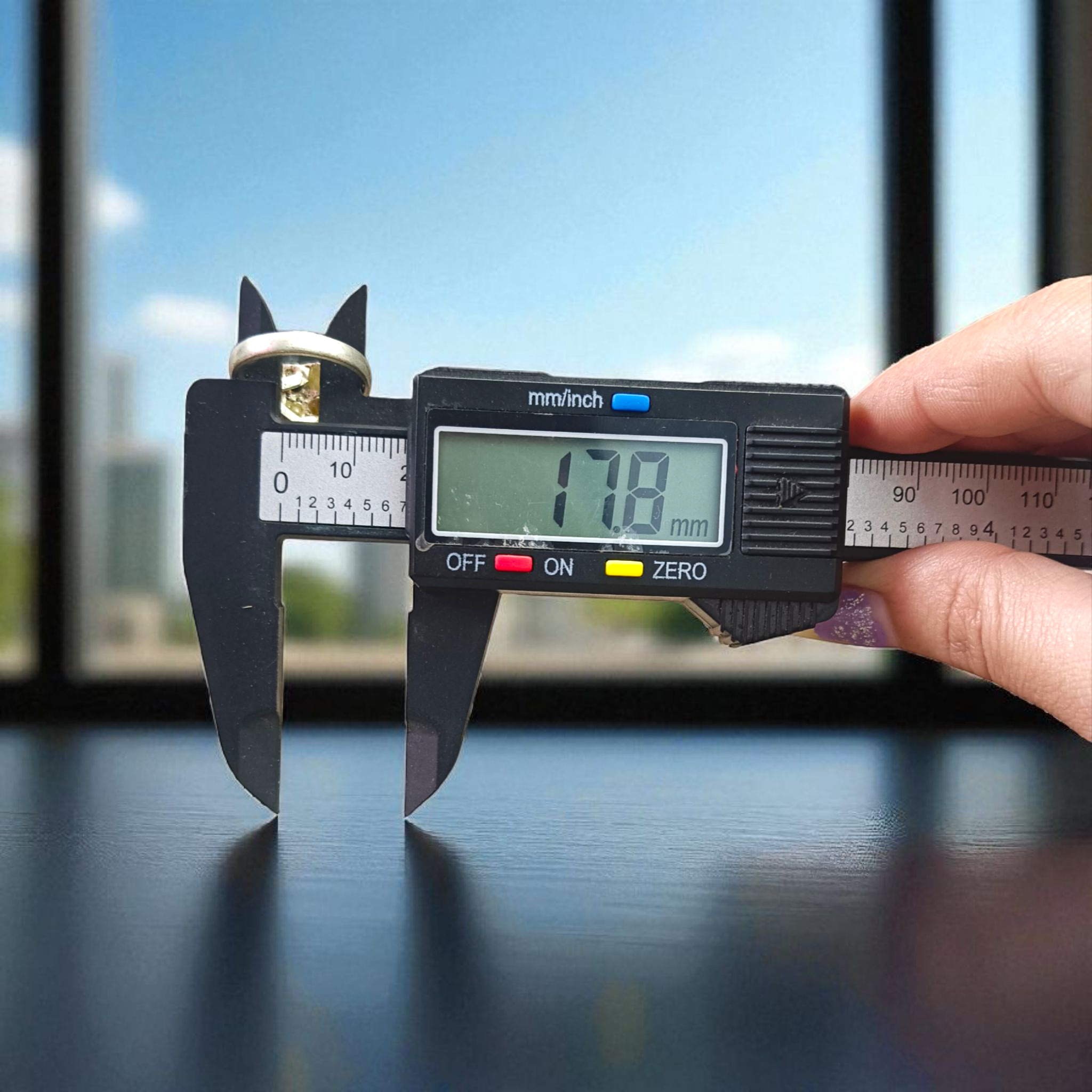 Elegant Navratan ring with a square-shaped design featuring nine vibrant gemstones, available at Timeshopee.