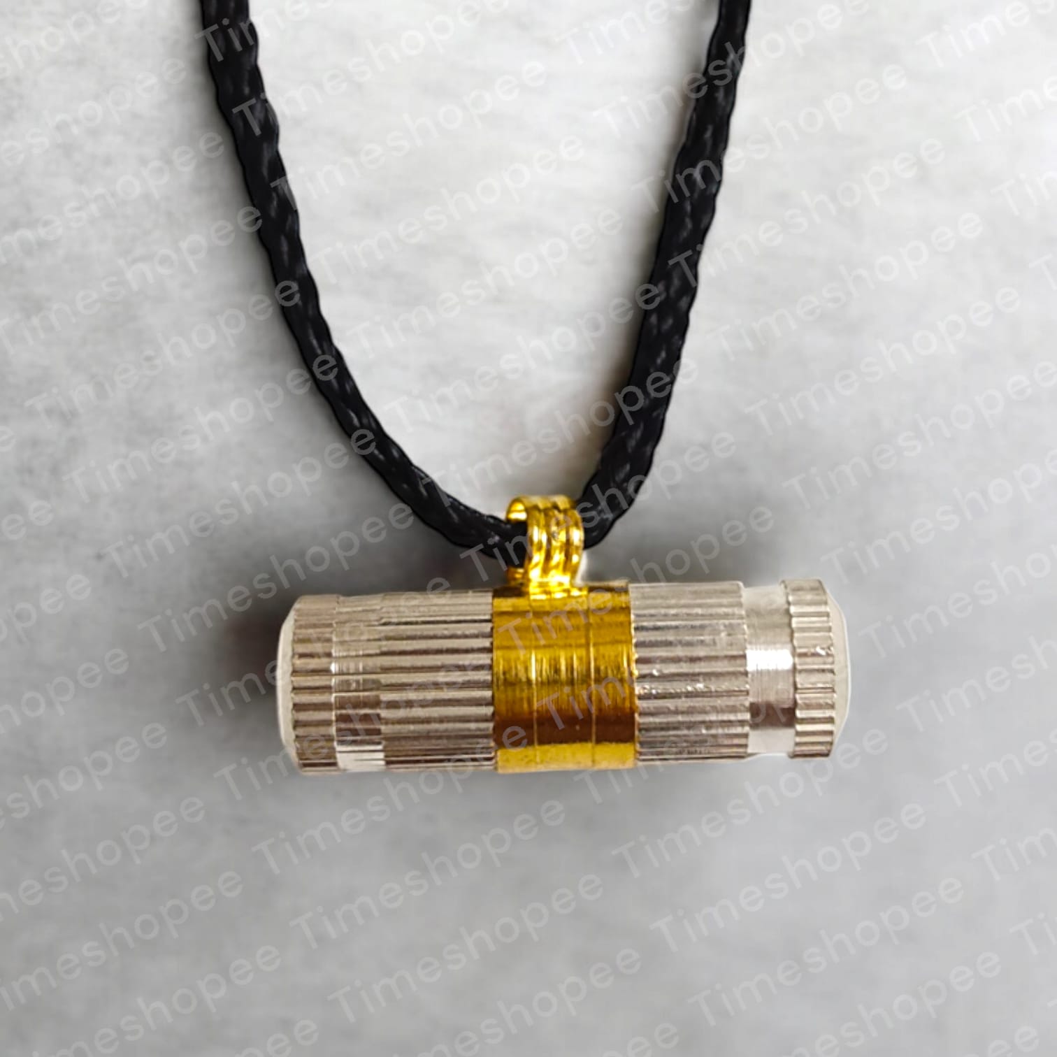 Elegant silver and golden taweez amulets displayed with a Bhojpatra sheet, highlighting their luxurious design and spiritual purpose