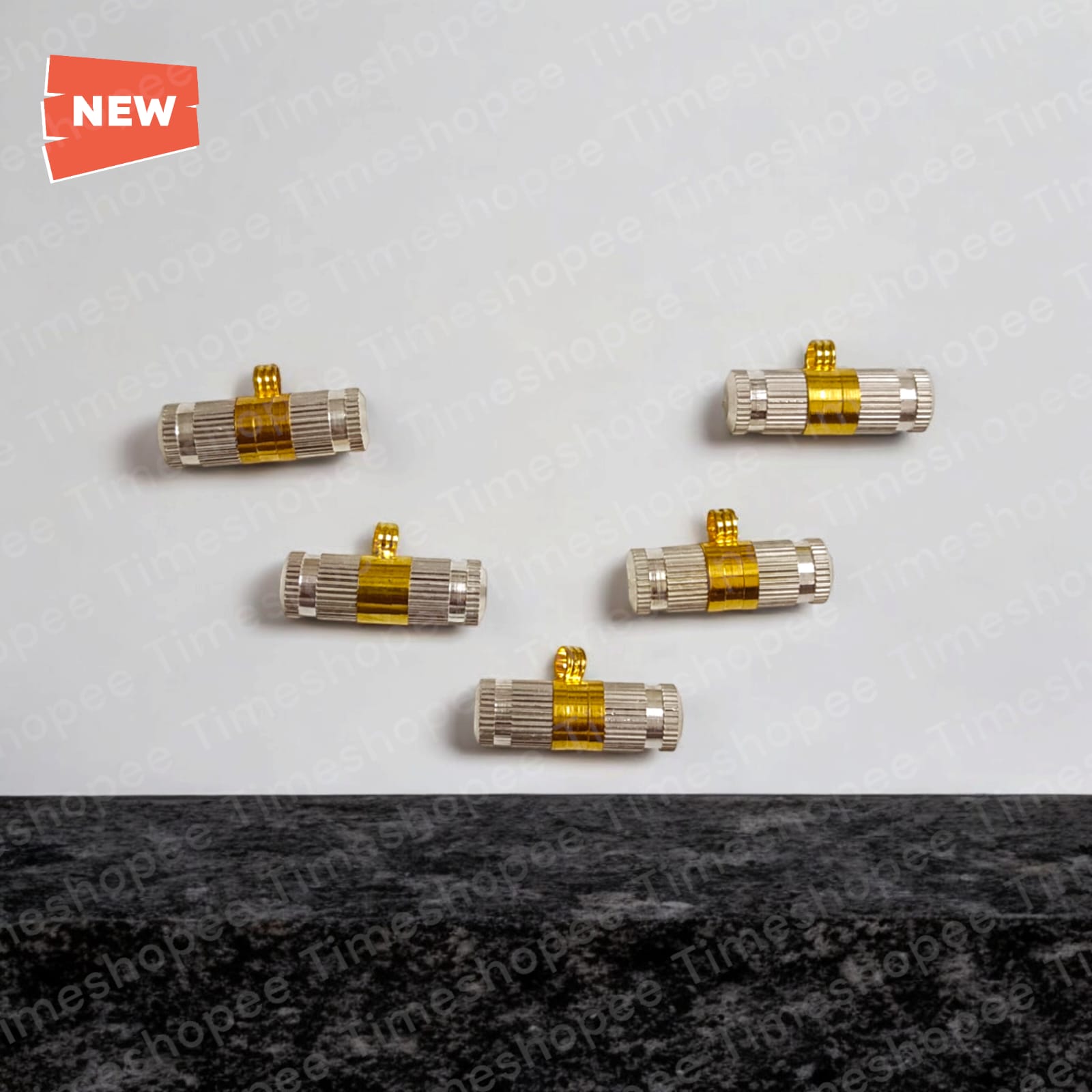 Elegant silver and golden taweez amulets displayed with a Bhojpatra sheet, highlighting their luxurious design and spiritual purpose