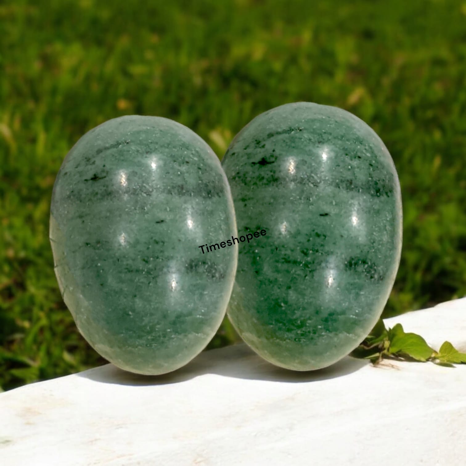 Greenish Black Shivling Stone for Tulsi and temple use, symbolizing stability and divine energy with unique natural patterns.