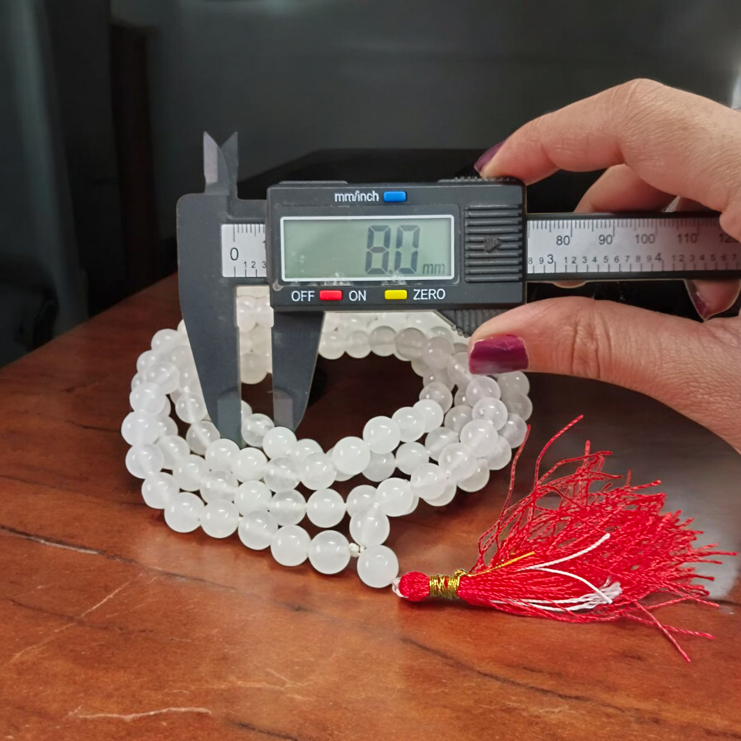 High-quality Crystal (Sphatik) Mala with 108+1 transparent 8MM beads, ideal for meditation and spiritual healing, displayed on a white background