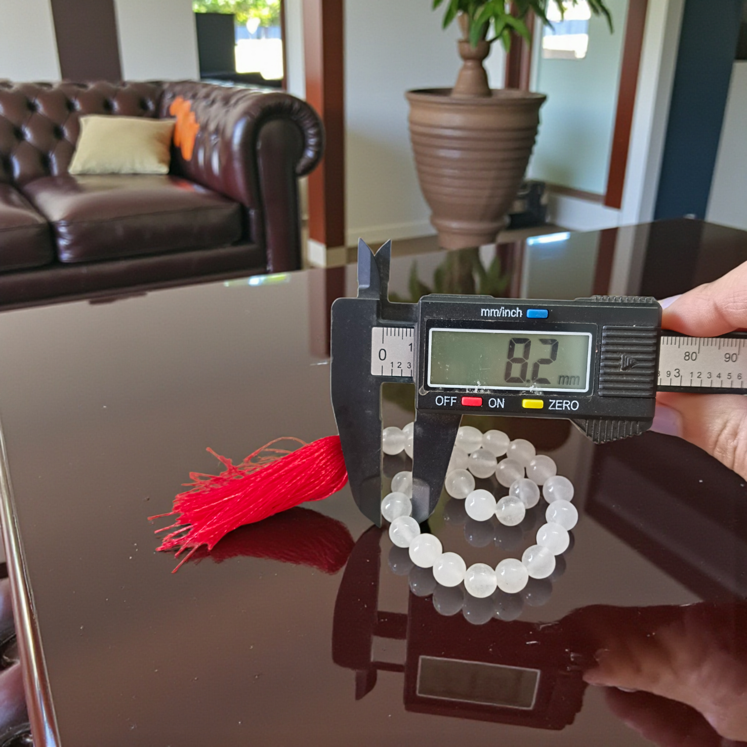 High-quality Crystal (Sphatik) Mala with 108+1 transparent 8MM beads, ideal for meditation and spiritual healing, displayed on a white background