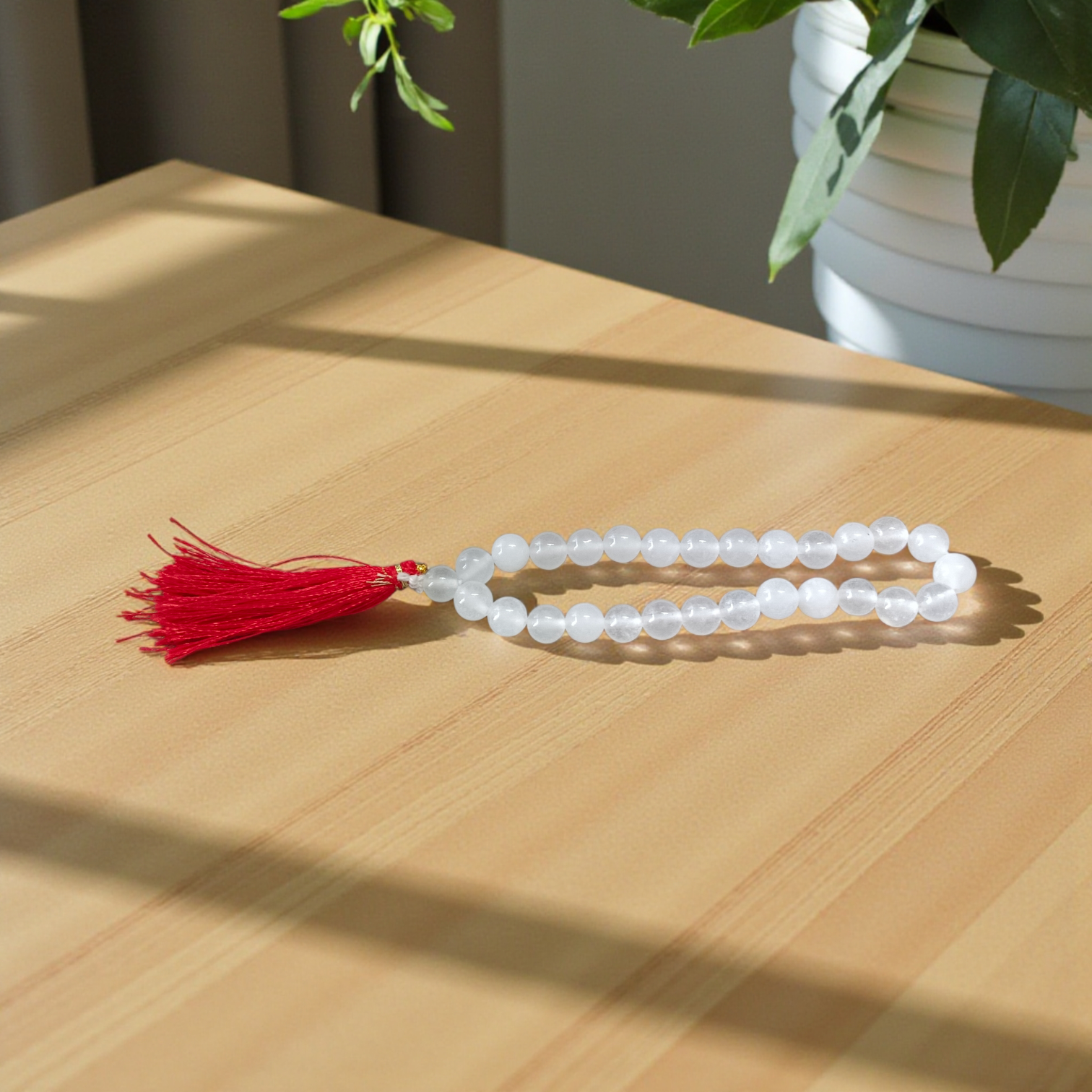 High-quality Crystal (Sphatik) Mala with 108+1 transparent 8MM beads, ideal for meditation and spiritual healing, displayed on a white background